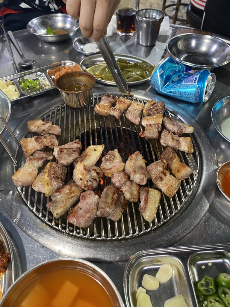 Black pork BBQ being grilled at Sukseongdo